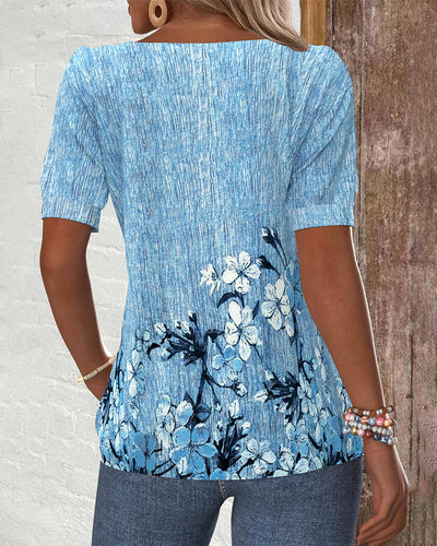 VERA™ - Blus med sned krage, tryck och knappar